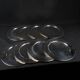 Set of 8 round serving platters or saucers in vintage stainless steel
