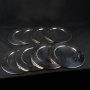 Set of 8 round serving platters or saucers in vintage stainless steel