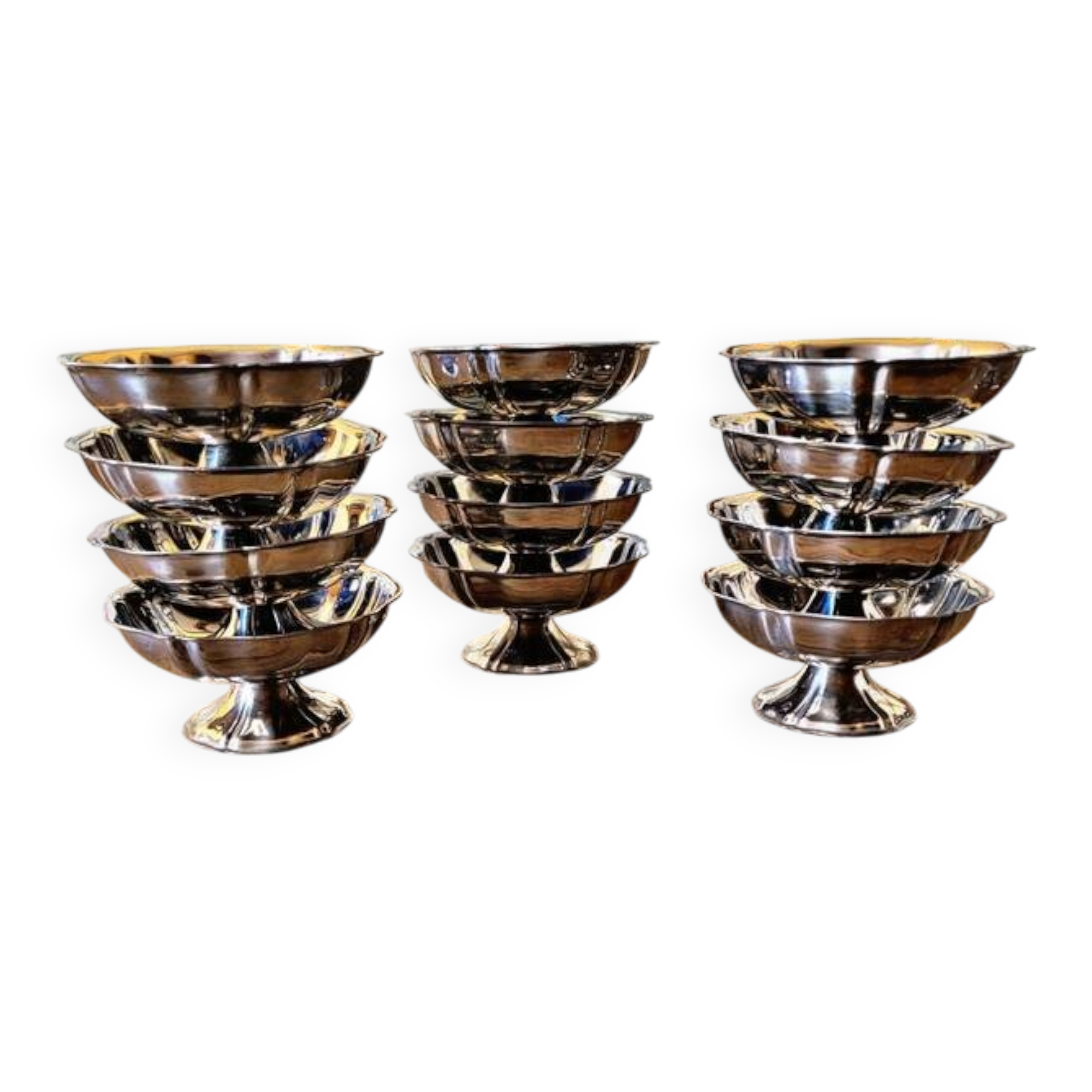 Stainless steel ice bowls by Guy Degrenne, low bowls in the shape of a flower.