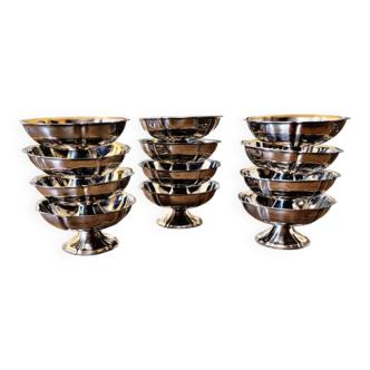 Stainless steel ice bowls by Guy Degrenne, low bowls in the shape of a flower.