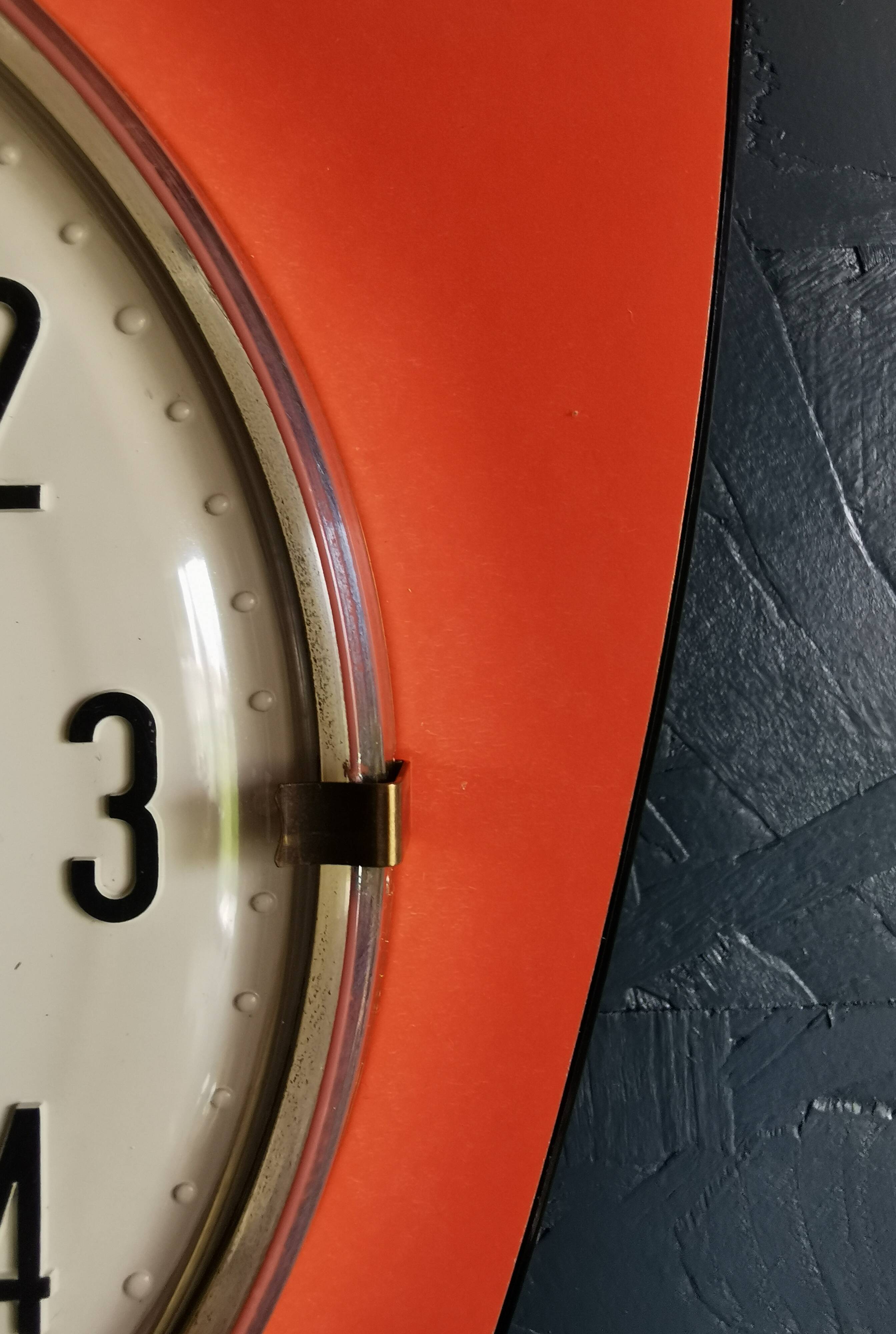 Vintage formica clock asymmetrical silent wall clock "Jaz orange"