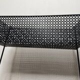 1950s black perforated metal planter in the style of Mathieu MATEGOT