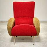 Red and mustard yellow fabric armchair in 1970s style