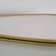 Vintage ovoid mirror with gold and black edges - 1960s