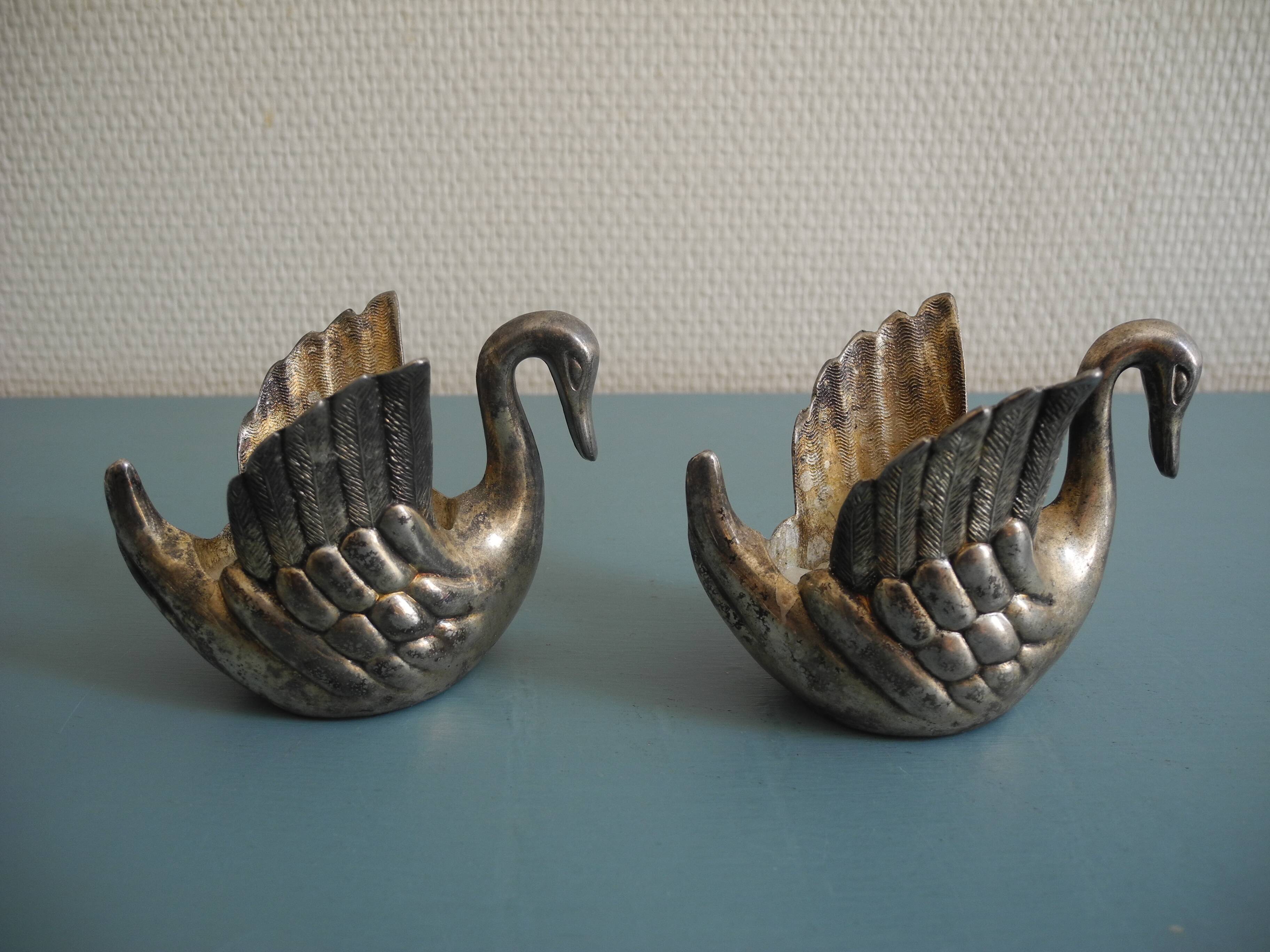 pair of vintage silver metal swan candlesticks