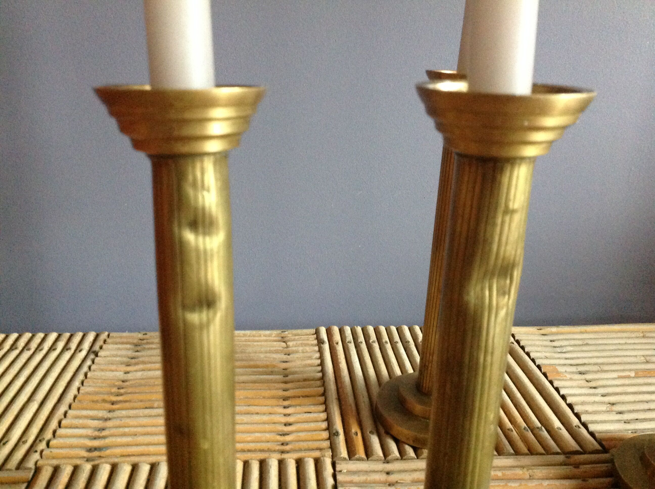 Series of 4 brass candlesticks