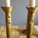 Series of 4 brass candlesticks