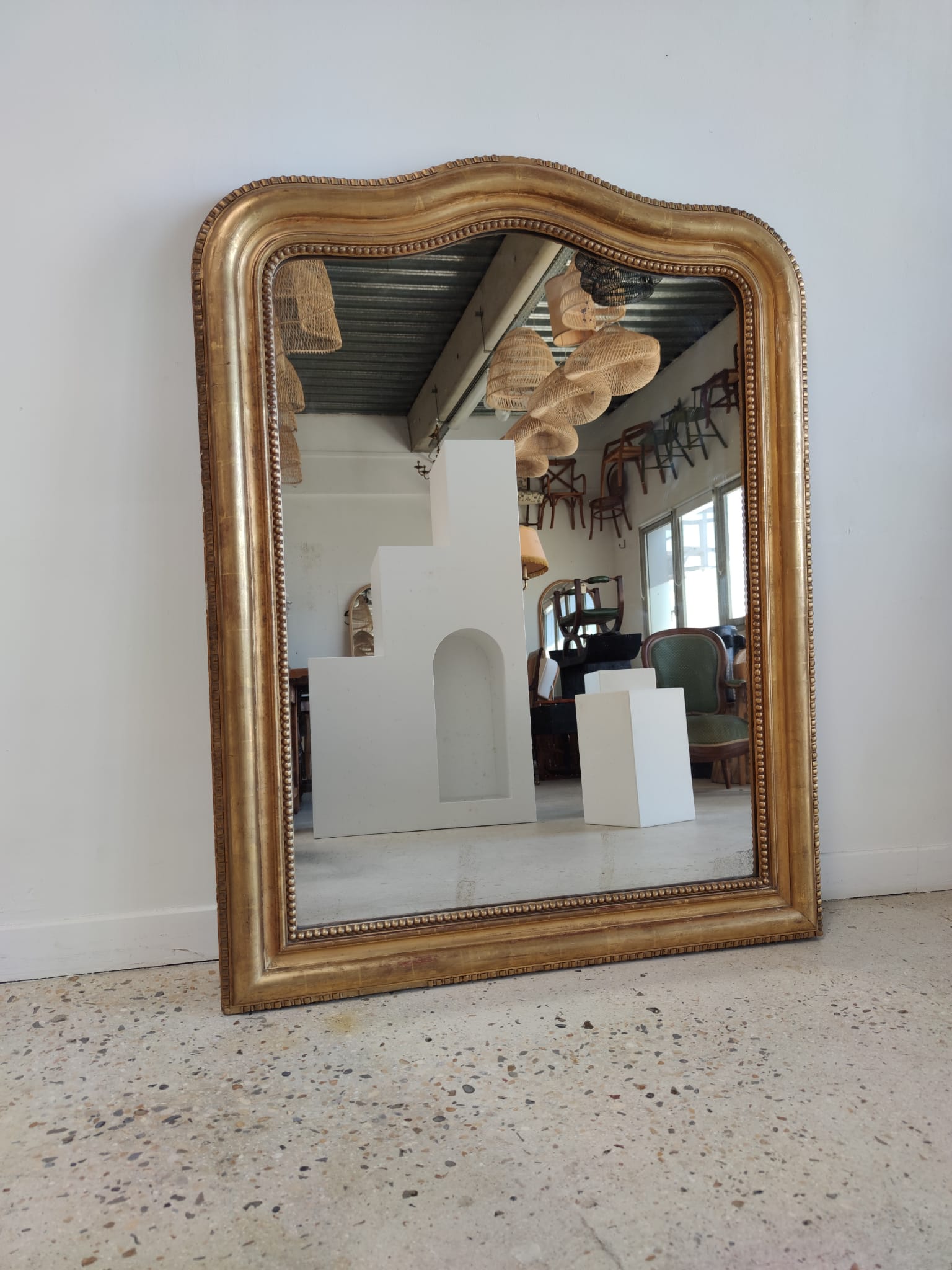 Louis Philippe gilded mirror with gendarme hat nineteenth H:130cm
