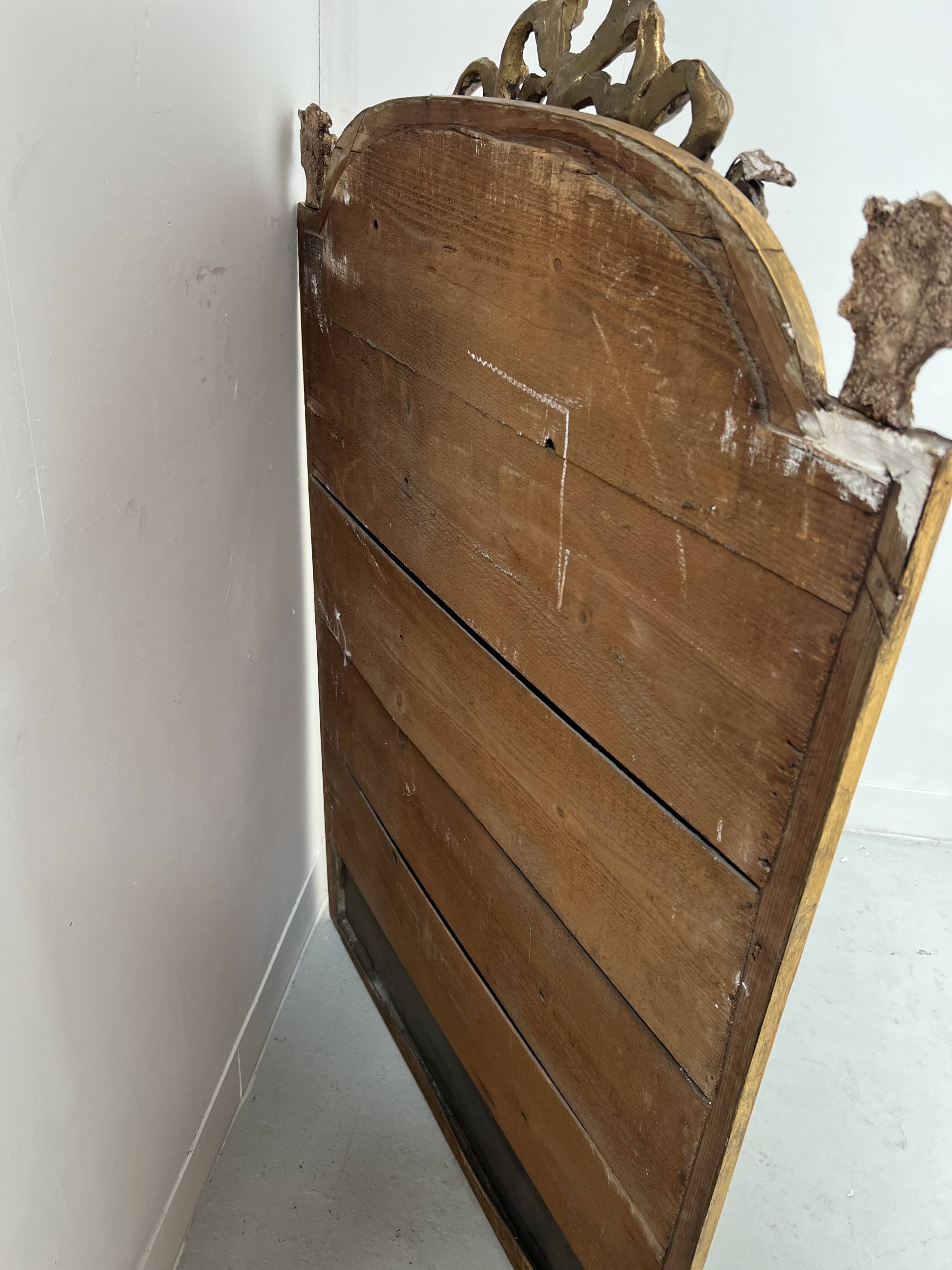 Louis XVI style mirror in wood and gilded stucco, 19th century