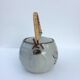 Vintage teapot wicker handle