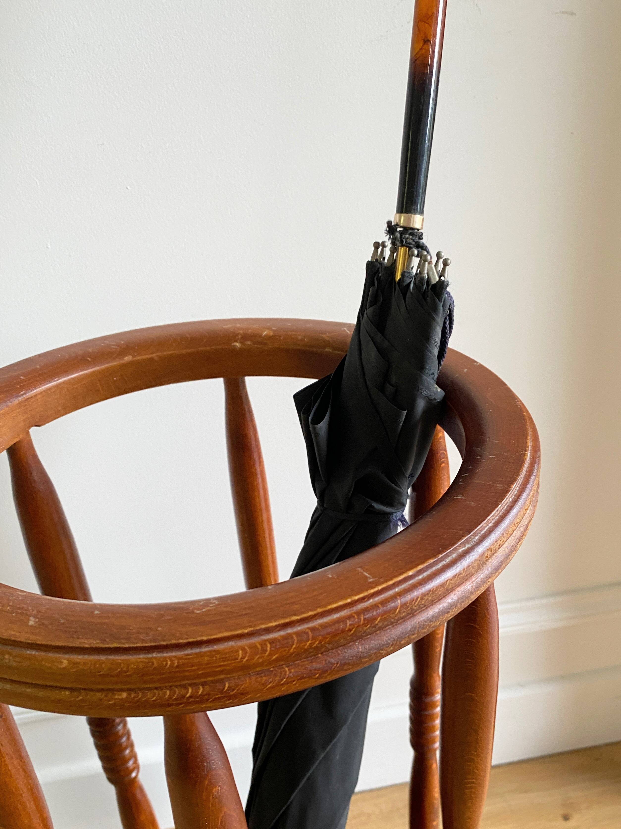 Vintage round wooden umbrella stand