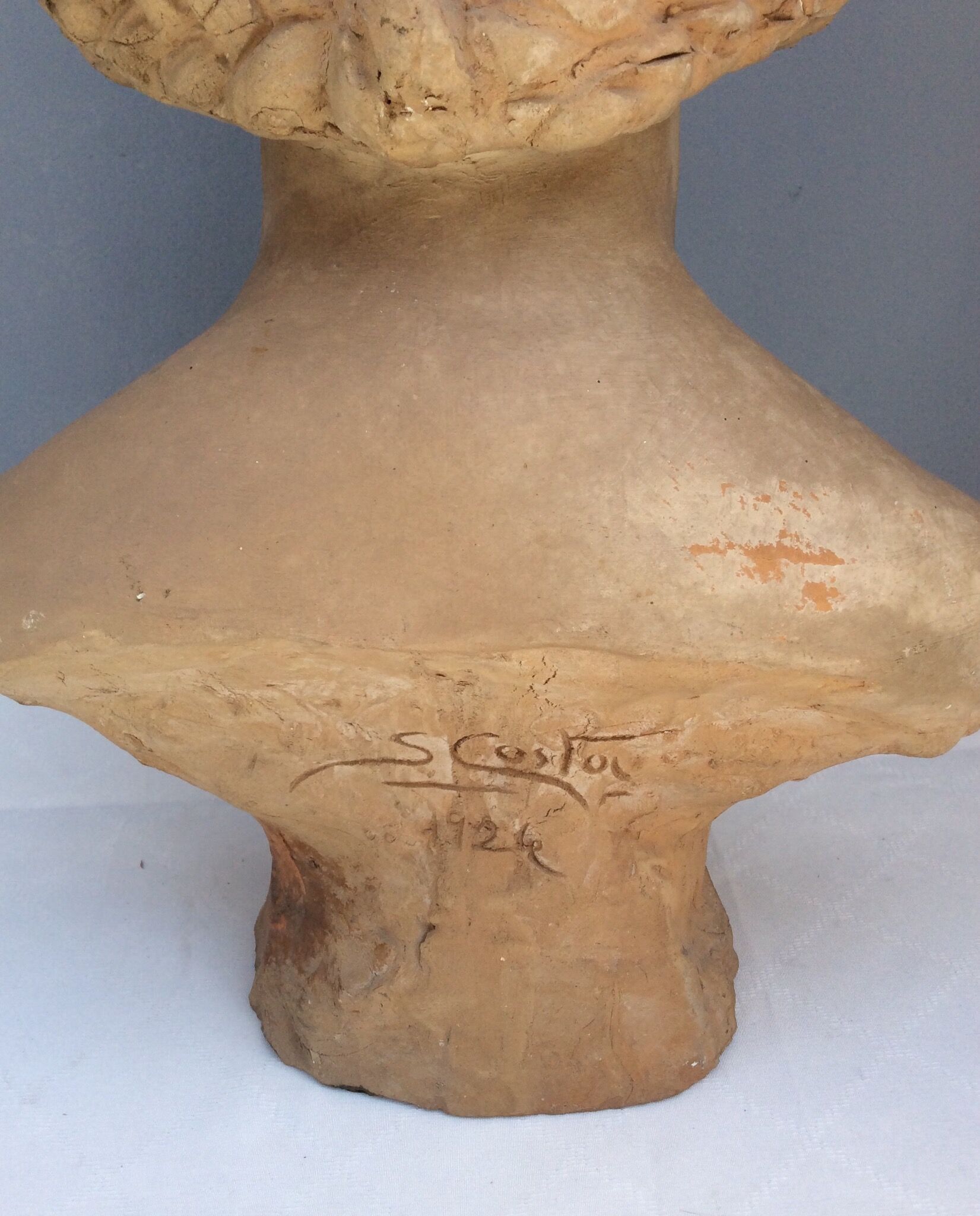 Bust young woman in terracotta, signed, 30s