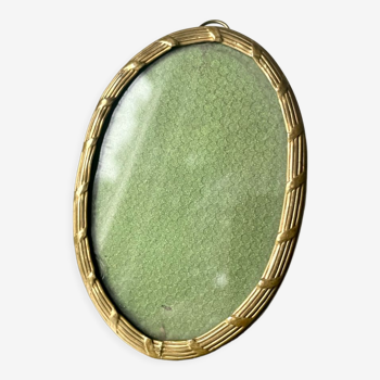 Metal gold colored oval picture frame brass