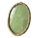 Metal gold colored oval picture frame brass