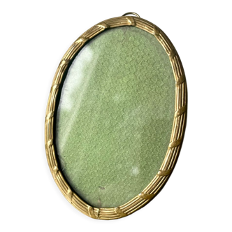 Metal gold colored oval picture frame brass