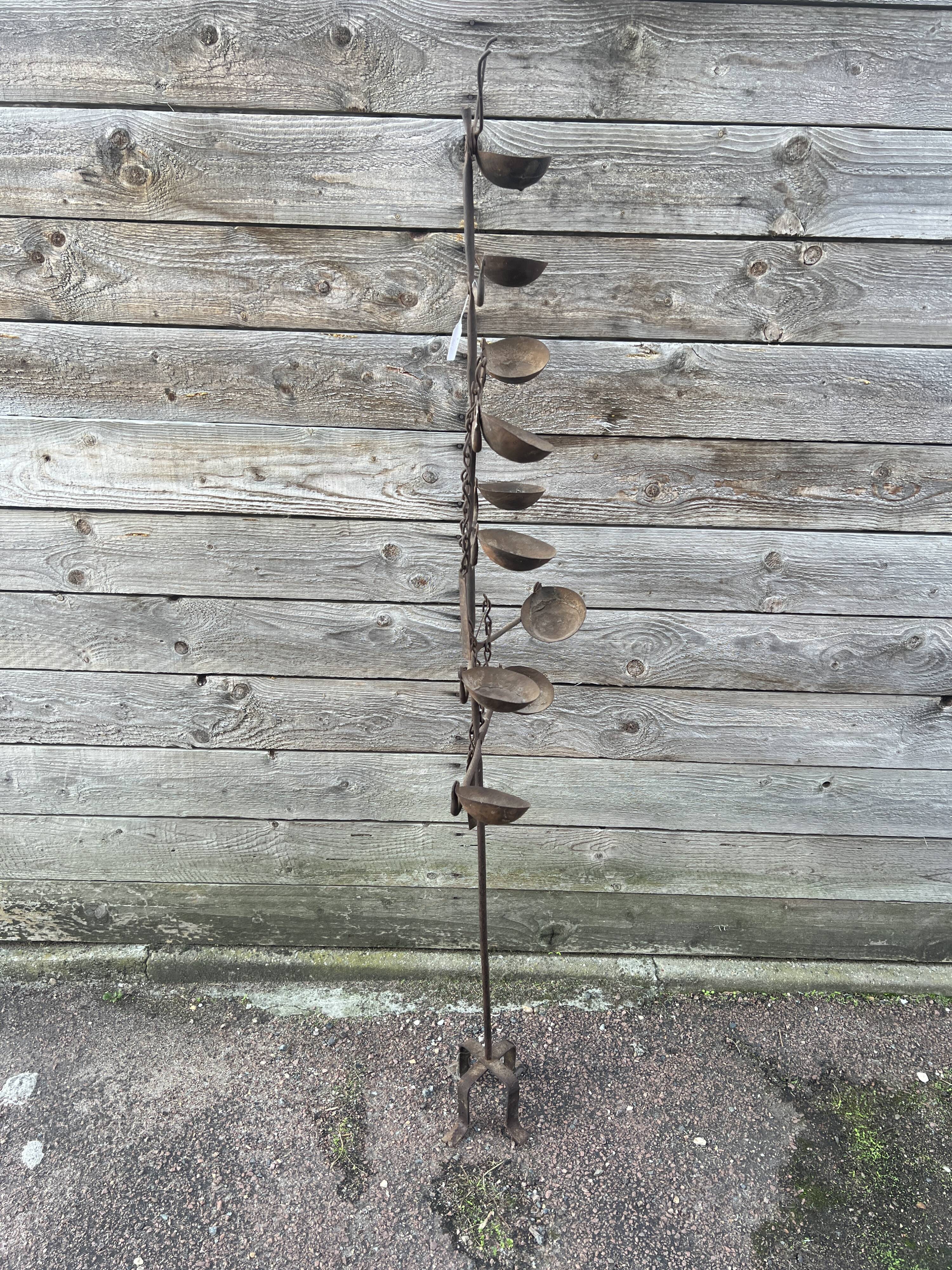 African oil lamps on stands