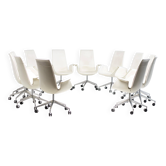 Neuf chaises à dossier haut en cuir blanc sur roulettes par Fabricius & Kastholm.