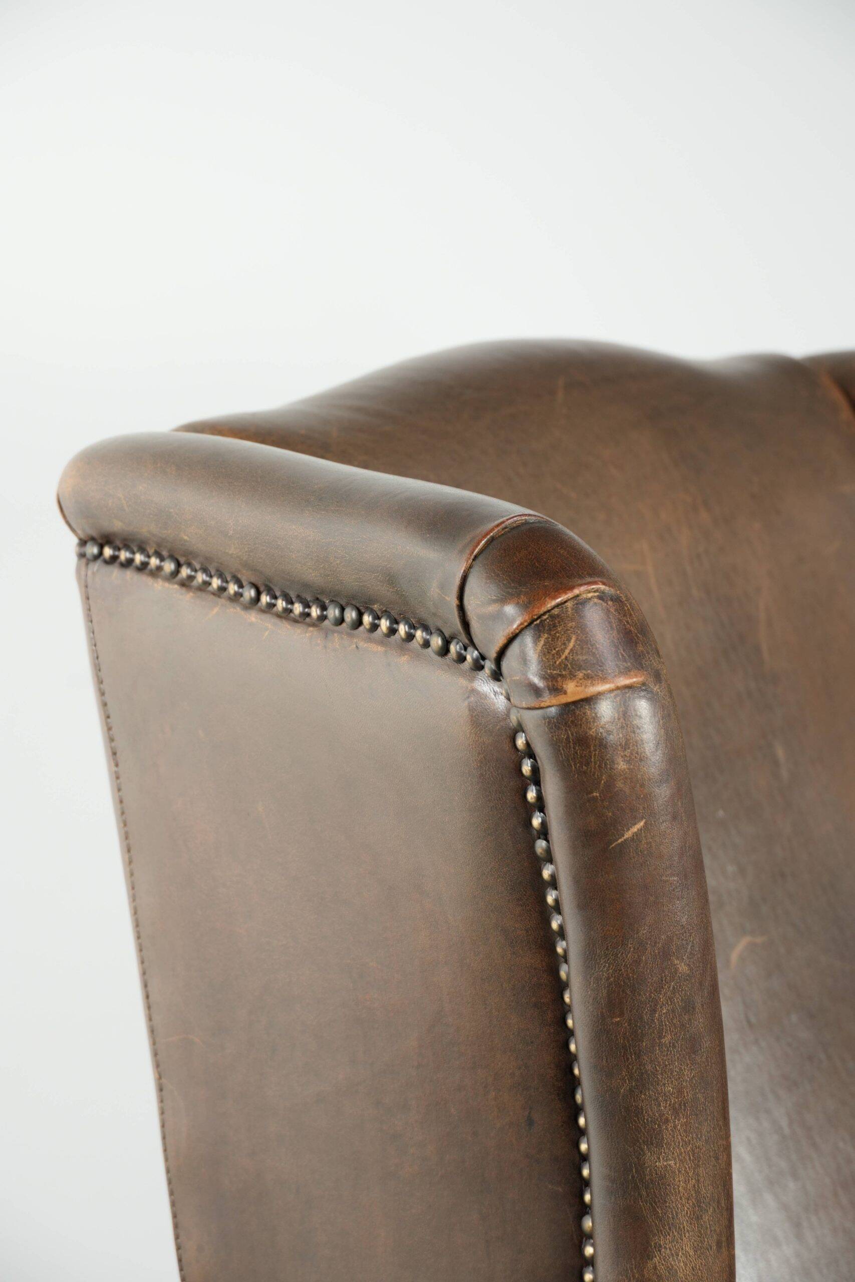 Large sheepskin wingback armchair with beautiful warm colours