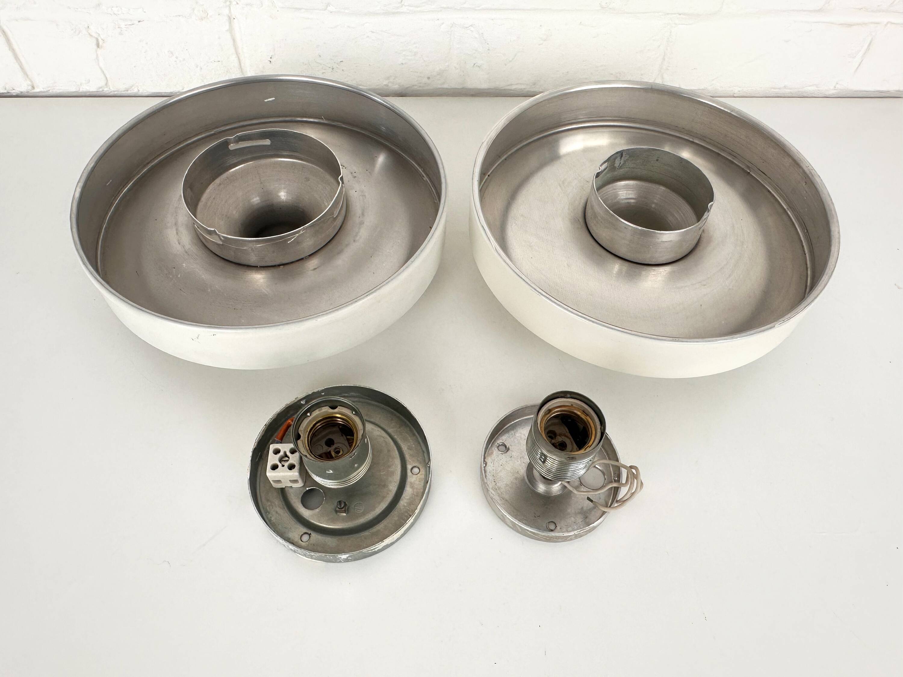 Pair of wall lights selected by Charlotte Perriand, Germany 1960