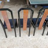 Octagonal table paul michel and its black lacquered chairs and elm magnifying glass