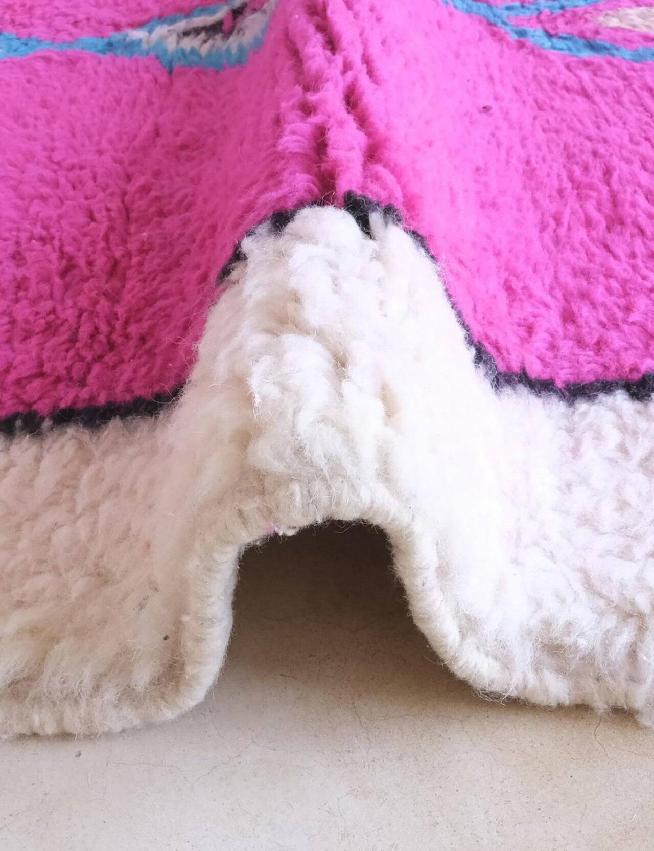 Traditional hand-woven wool Berber rug in pink, size 150 x 250