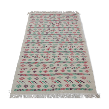 White carpet with multicolored Berber patterns handmade