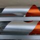 Pair of orange brushed aluminum wall light
