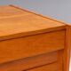 Vintage Czech chest of drawers U-453 by Jiří Jiroutek, 1960s, oak veneer, 110 × 45 × 77 cm