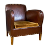 Antique club armchair of leather cloth