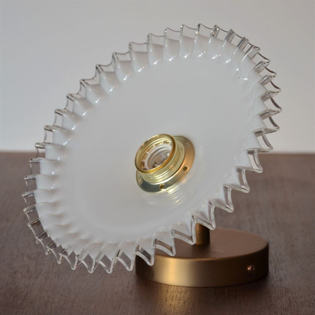 Golden articulated wall lamp, white opaline in pleated glass