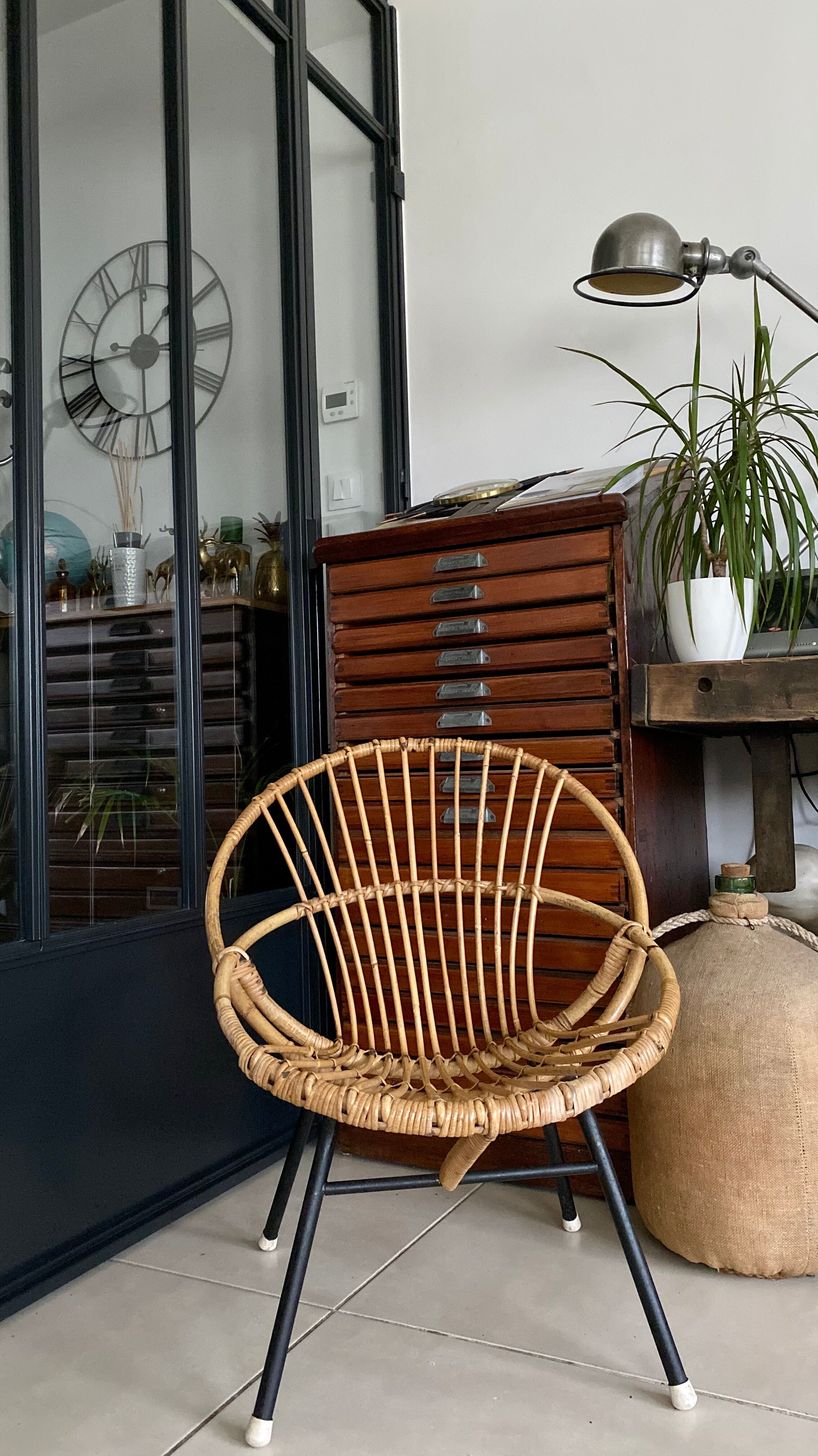 Old vintage metal foot rattan chair