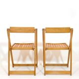 Pair of wooden folding chairs from the 80s.