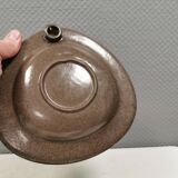 Wall-mounted candlestick in grayish colors, Danish and from the 1970s-80s.