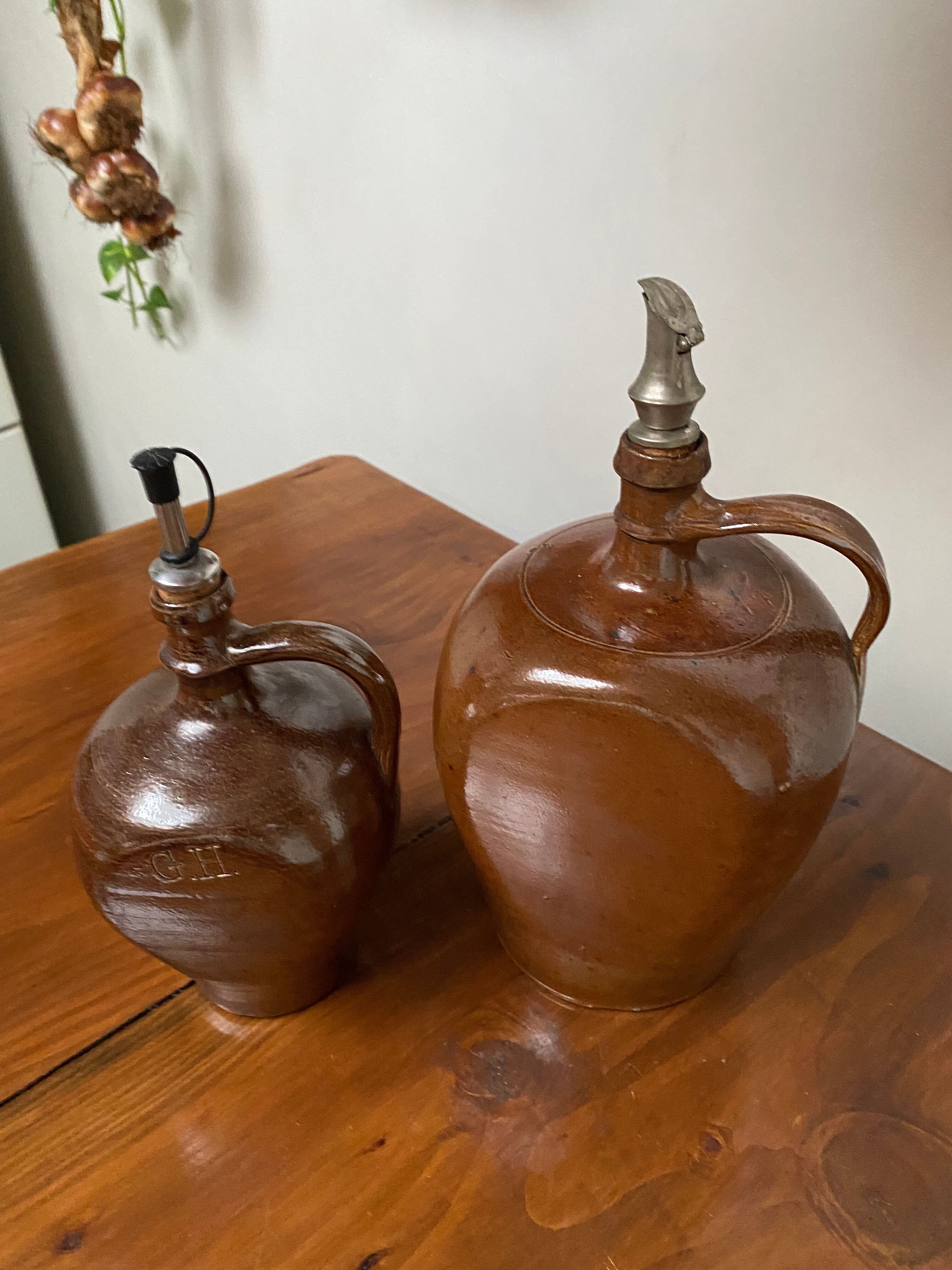 Pair of bottles in sandstone