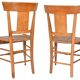 Pair of chairs with barrette backs and bands painted with animated landscapes