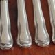 Ercuis - Set of 4 table knives model Chinon with metal outline.