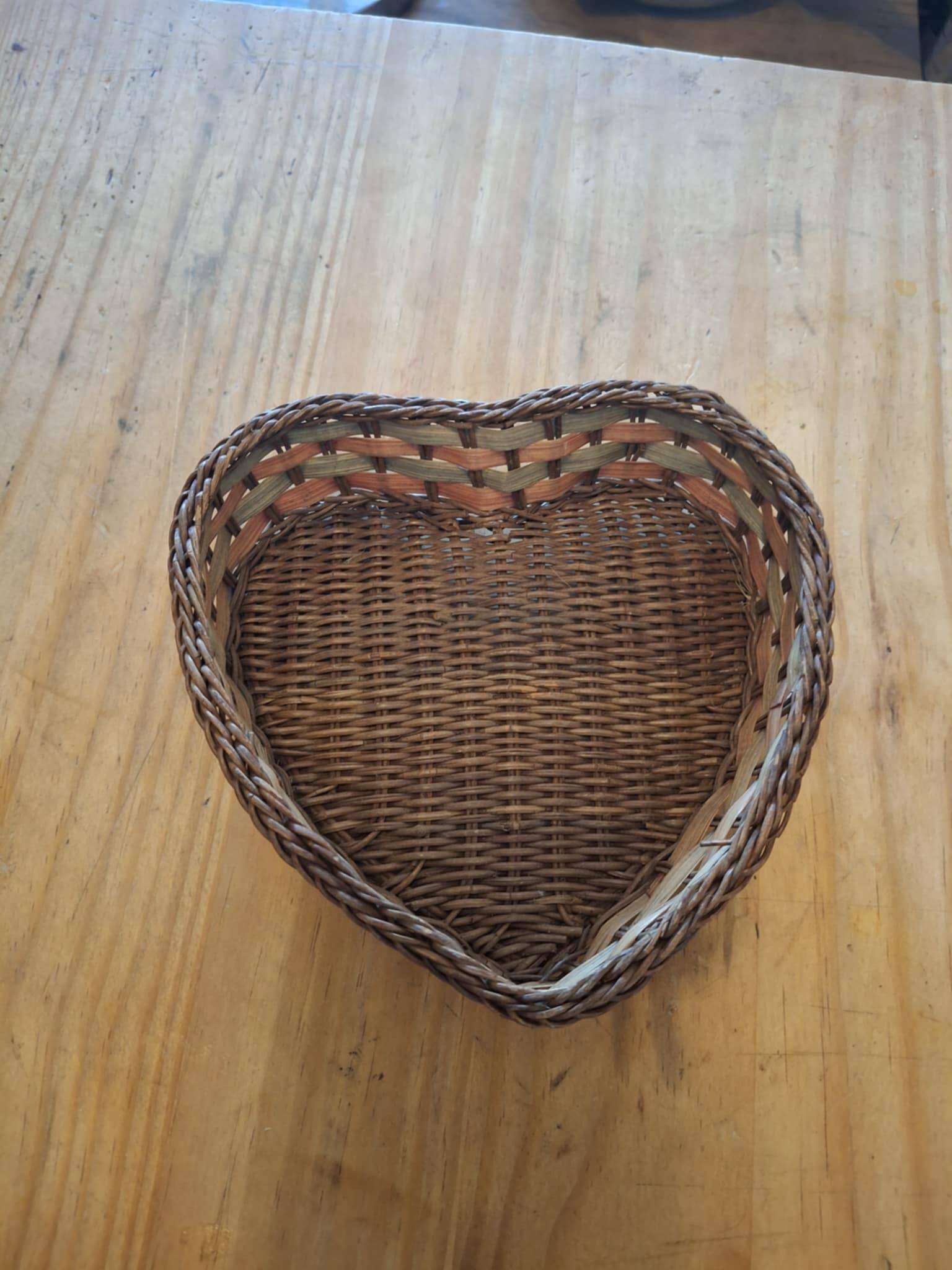 Small wicker basket in the shape of a heart.