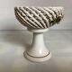 Braided ceramic ring pocket emptier