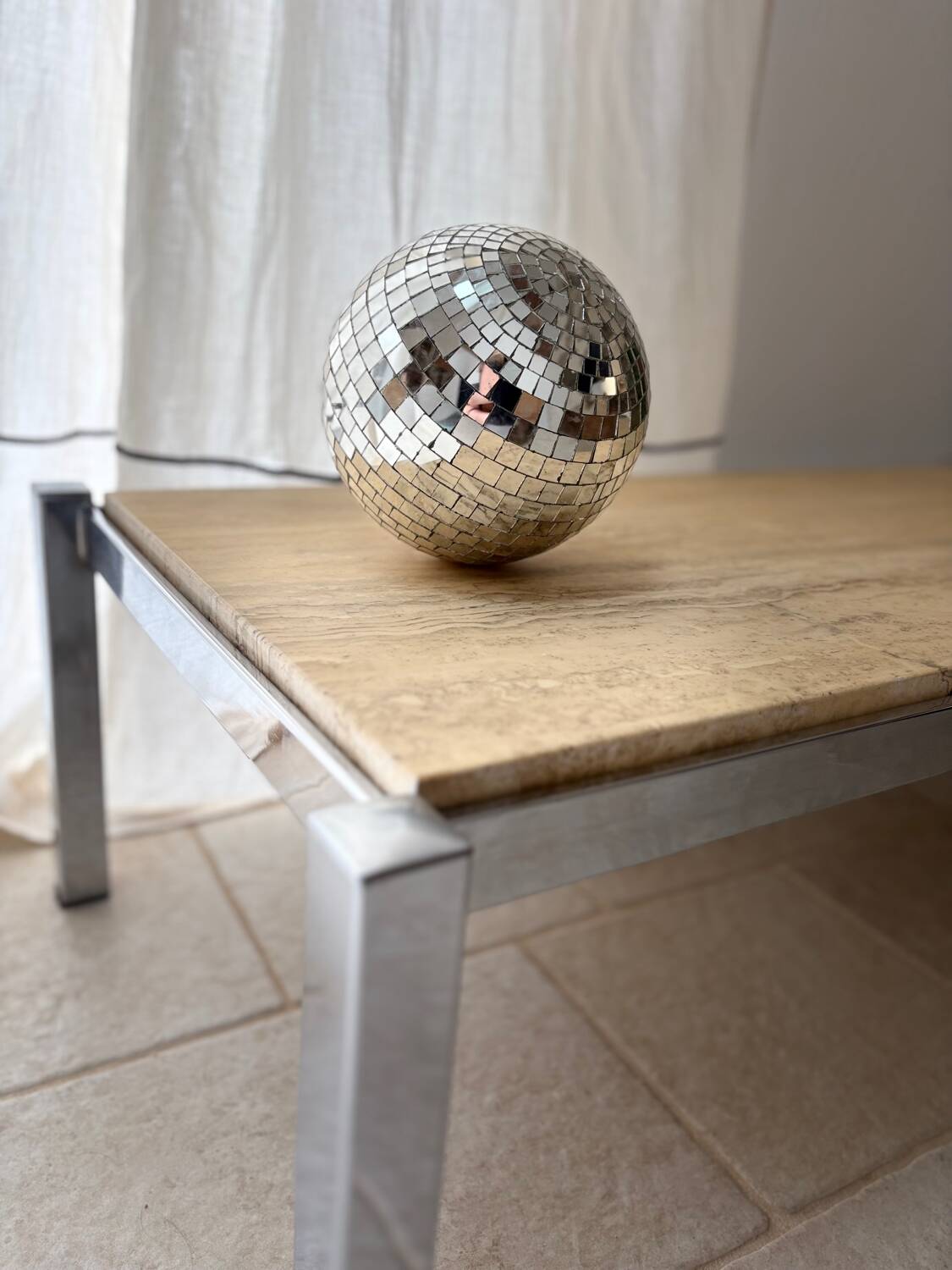 Chrome metal and travertine coffee table, 1970.
