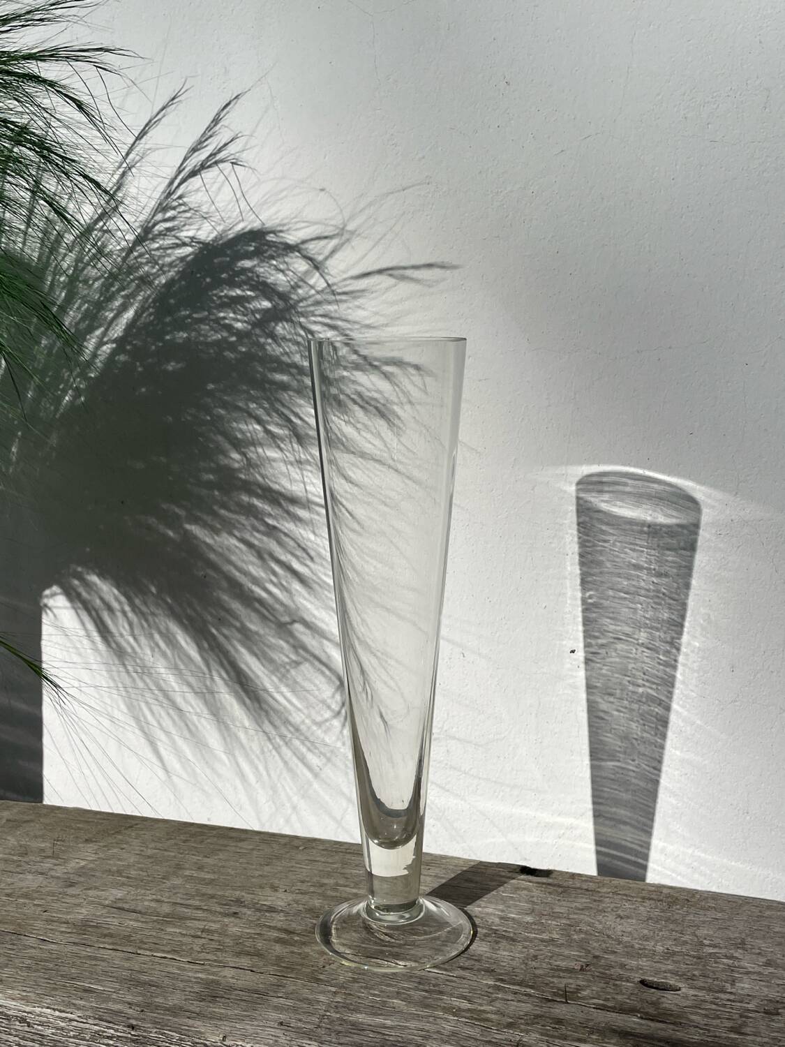 Large conical vase in clear designer glass.