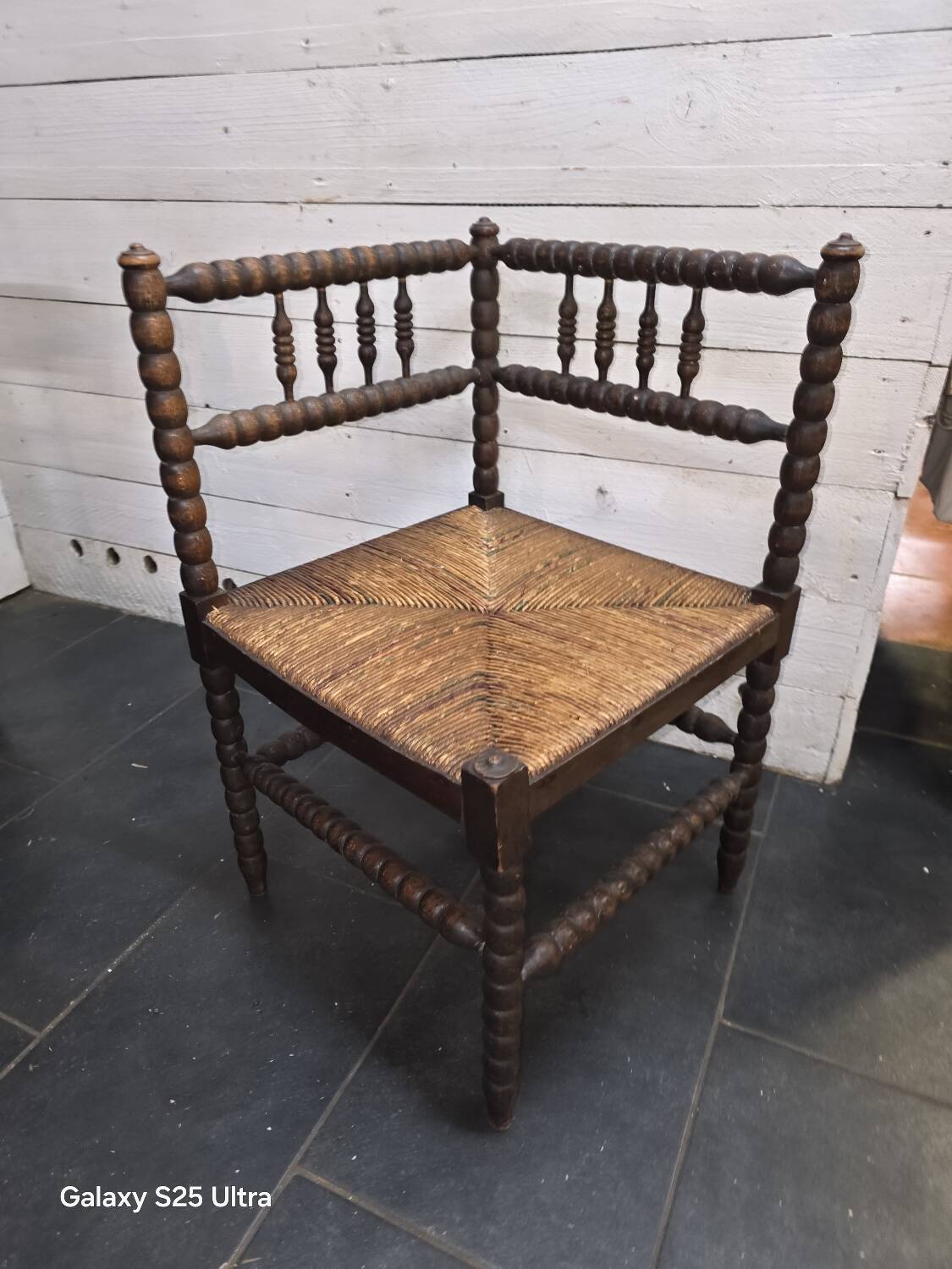 Antique corner fireplace armchair