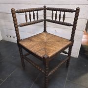Fauteuil de coin de cheminée ancien