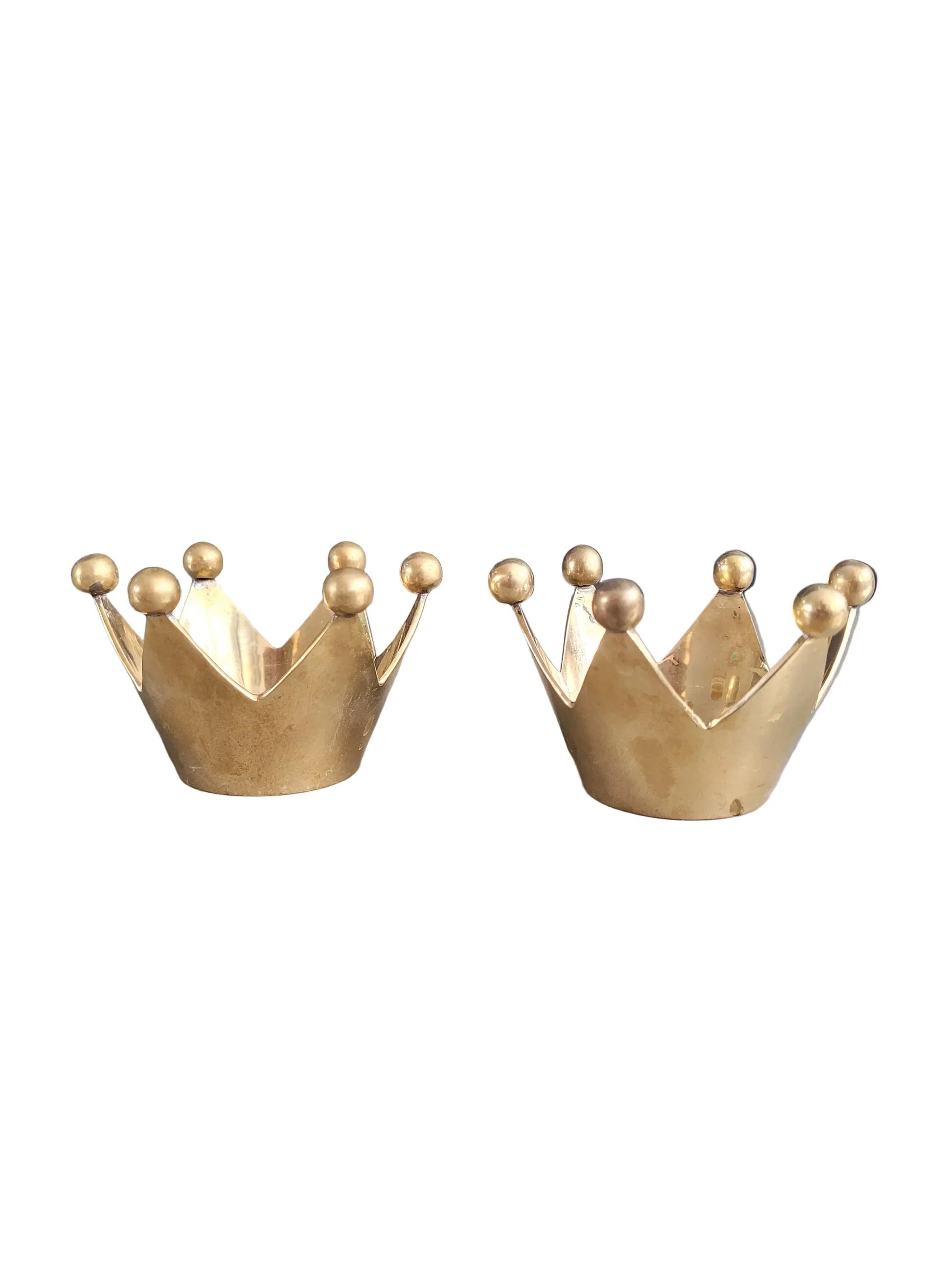 Pair of crown candle holders in brass