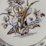 Set of 6 plates plus 1 in English porcelain, early 20th century