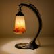 Bronze eagle lamp patinated and Art Nouveau style glass pate