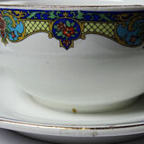 Old Lunéville sauce boat, opaque porcelain with polychrome decoration.