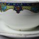 Old Lunéville sauce boat, opaque porcelain with polychrome decoration.