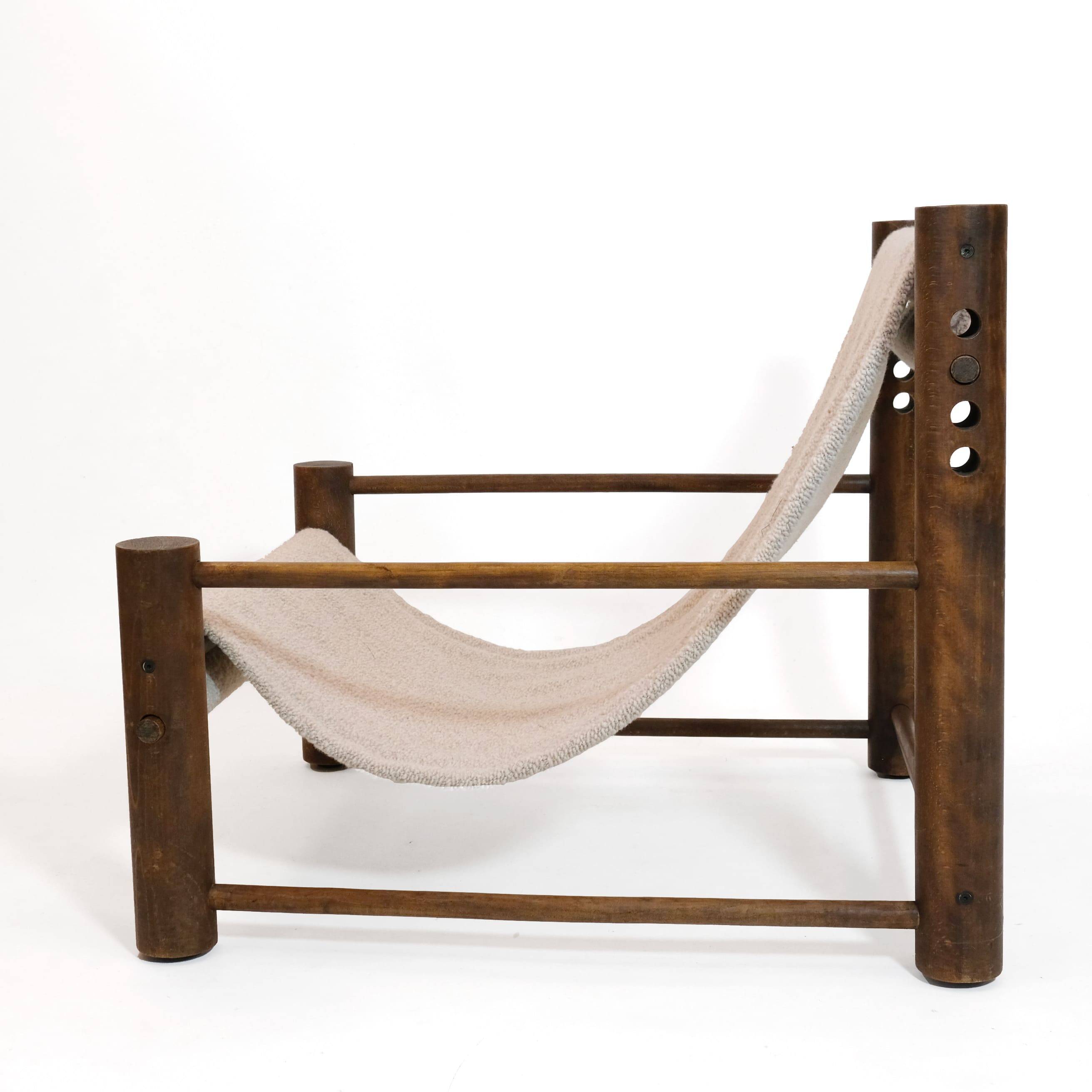 Solid wood armchair with adjustable backrest.