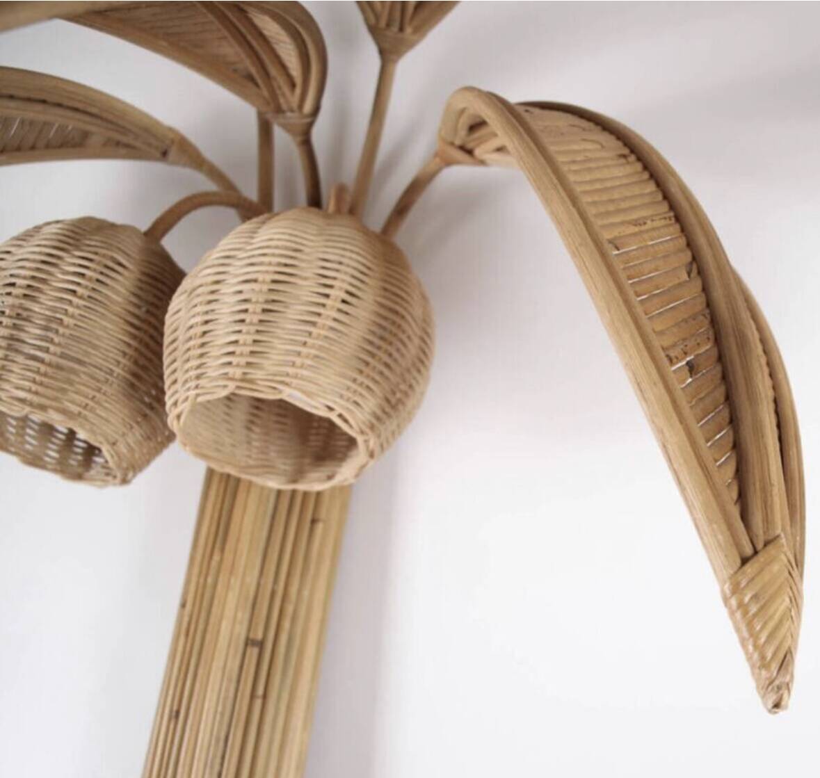 Pair of large "coconut/palm" wall lights in rattan.