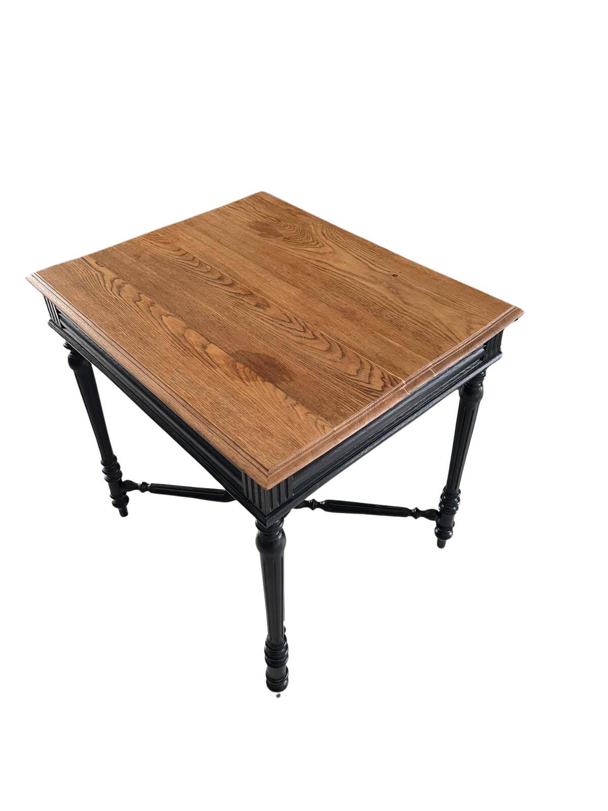 Antique solid wood table, raw top and turned legs.